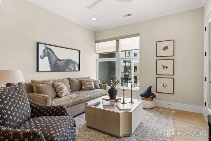 Equestrian prints, above the sofa